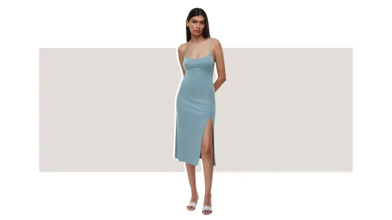 A model wearing a pale blue dress.