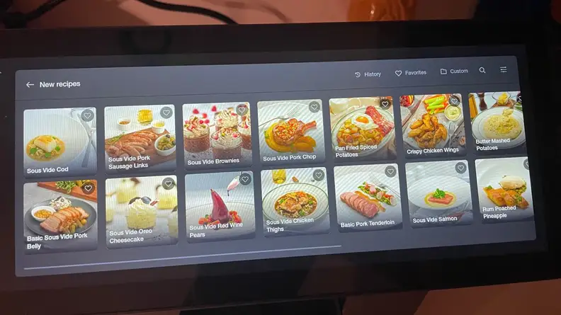Digital screen filled with small pictures of food on the Typhur Sous Vide Station.