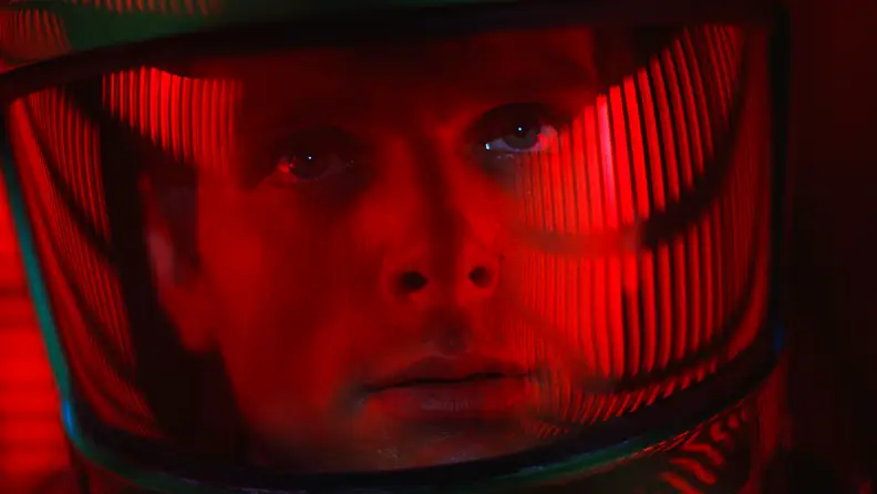Keir Dullea stars as David Bowman (pictured in close-up wearing a spacesuit) in 2001: A Space Odyssey.