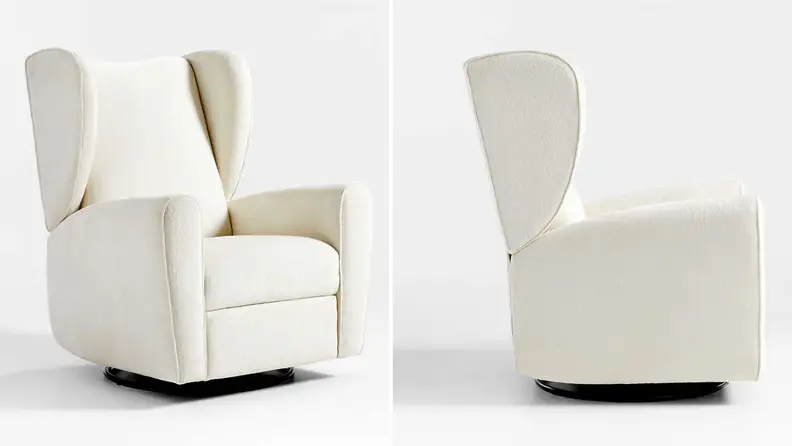 Two cream-colored Seesaw Nursery Power Recliners