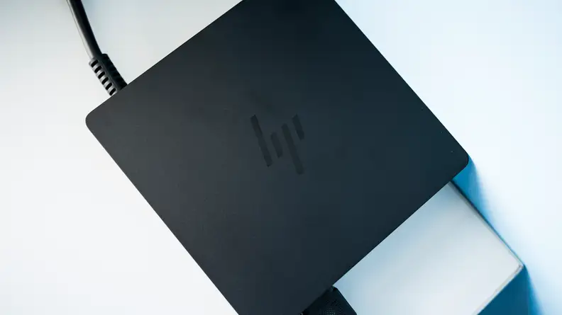 A closeup of the HP Envy's external power supply