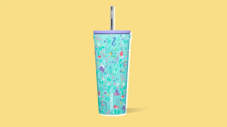 A turquoise drink tumbler with a repeating pattern of stylized characters from "The Little Mermaid"