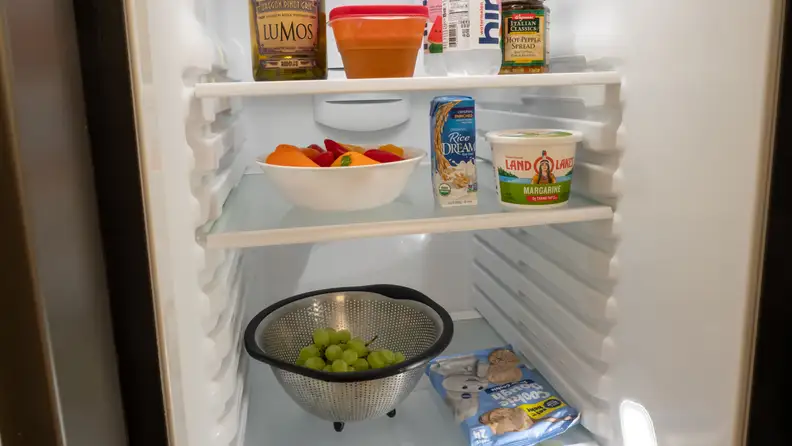 This GE has four LED lights in the fridge section that illuminate the entire cavity.