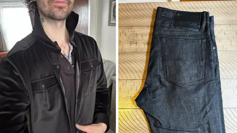 Selfie of a man wearing a black velvet shirt and black distressed denim jeans.