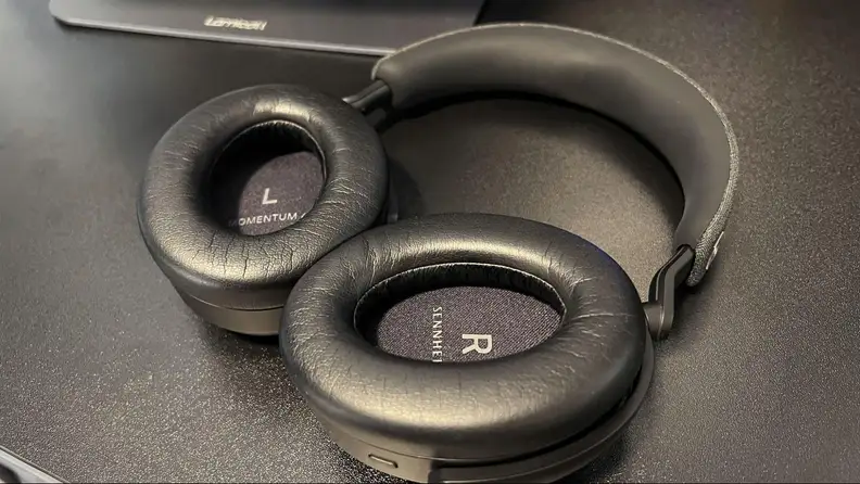The Sennheiser Momentum 4 laying down flat.
