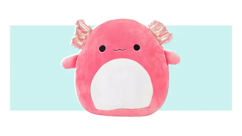 A pink Archie the Axolotl Squishmallow with a white belly.