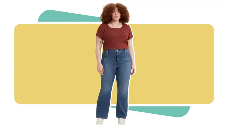 A woman wearing Levi's flare jeans.