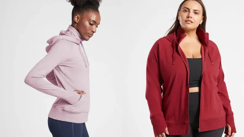 Women wearing athleta running jacket in lavender and red.