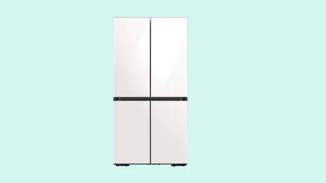 A white Samsung refrigerator against a light blue background.