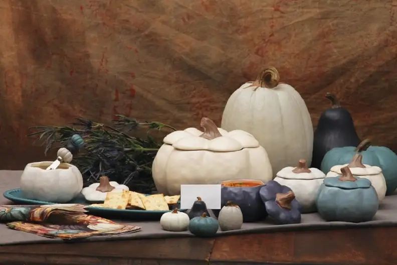A group of teal and white pumpkins