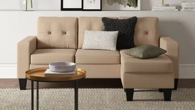 Tan colored couch in living room.