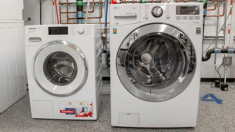 The Miele W1 washers are compacts, standing 33 1/2 inches tall,  23 1/2 inches wide, and 25 3/8 inches deep.
