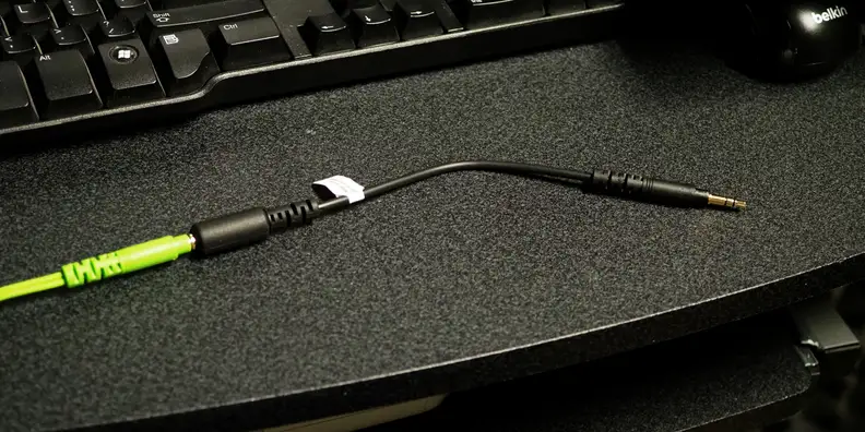 Some headphones have an adapter like this that limits volume. It's useful, but easily removed.