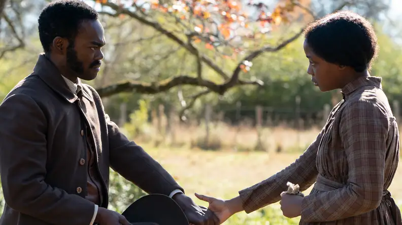 Thuso Mbedu as Cora Randall and William Jackson Harper as Royal in The Underground Railroad.