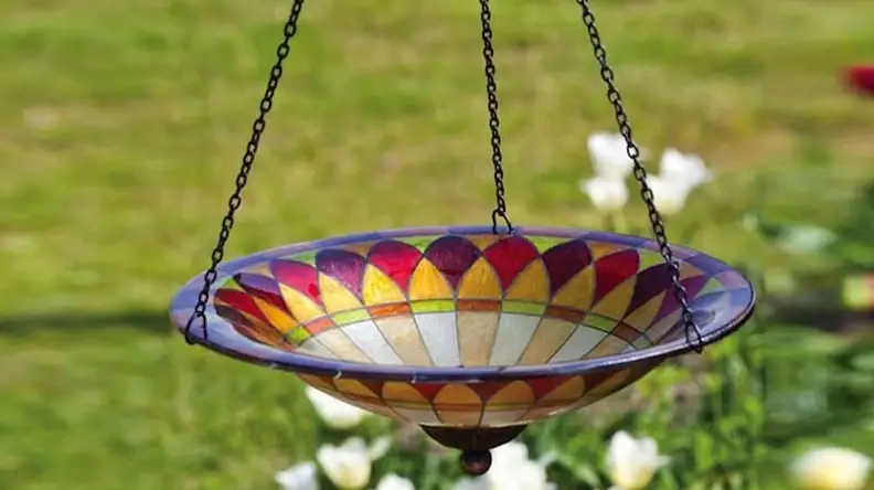 This stunning glass bird bath is a perfect gift for gardeners.