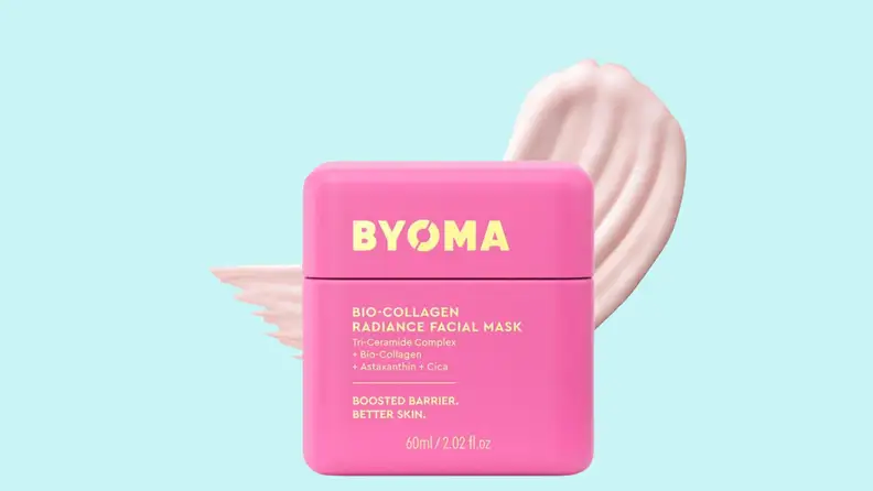 A pink package of By0ma face mask with a swoosh of the product behind it.