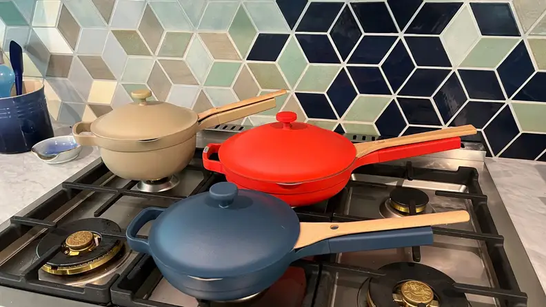 The Mini Always Pan & Perfect Pot on a gas range along with the full-sized Always Pan