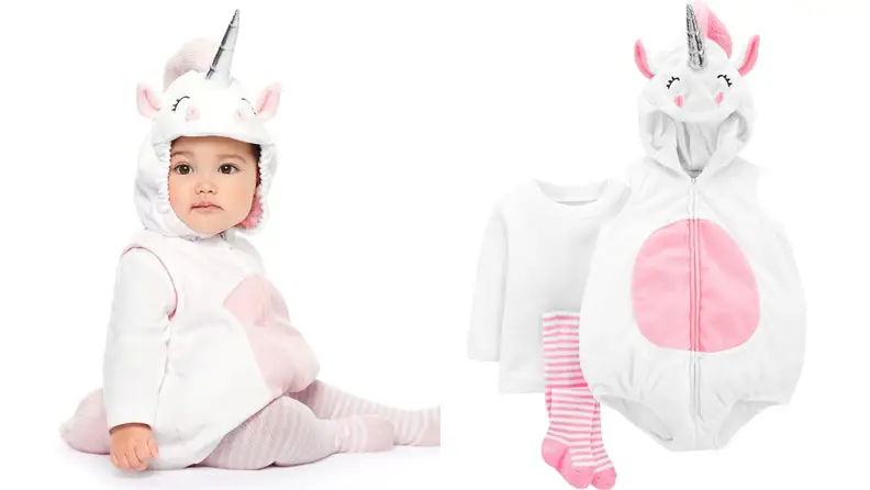A baby dressed as a white unicorn.
