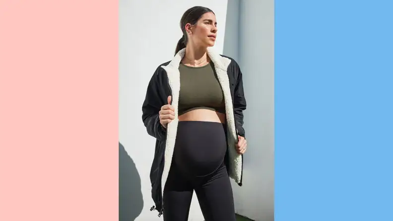 A woman wearing a sporty maternity outfit by Ingrid+Isabel.