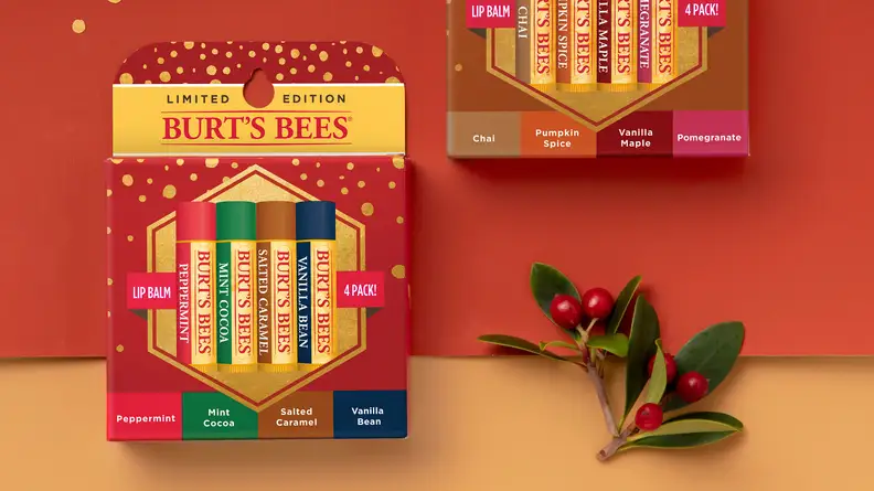 Burts bees chapsticks on festive red background