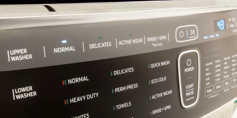 The list of cycles on the upper washer gives you an idea of what is supposed to go in there.