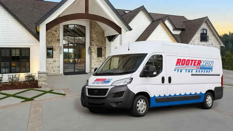 Service van parked in the driveway of a large home