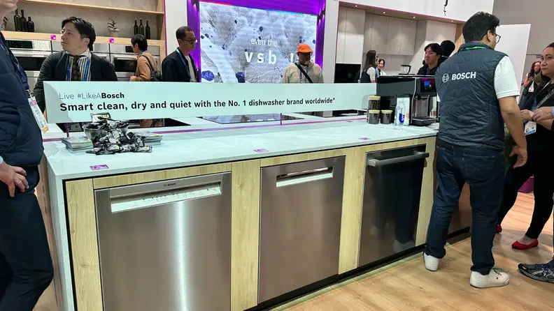 A line-up of dishwashers on the CES 2026 show floor