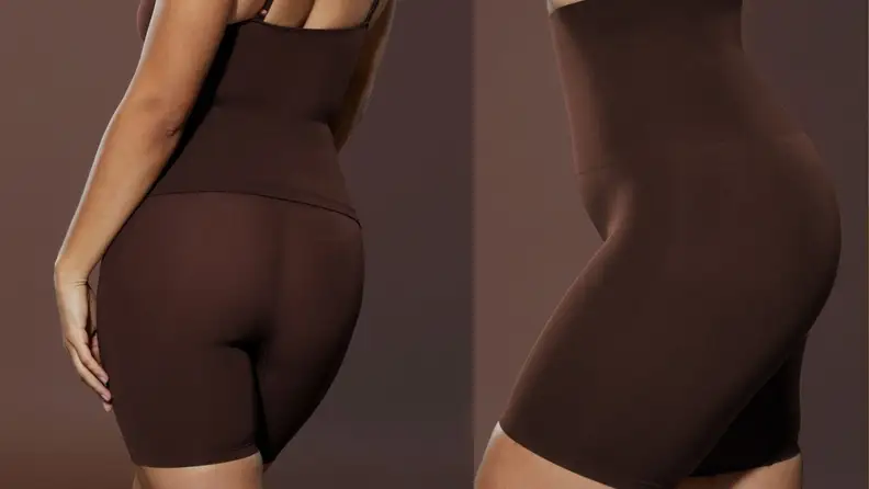 woman wearing dark brown shorts with matching cami