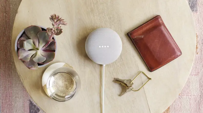 A Google Nest sits on a table.
