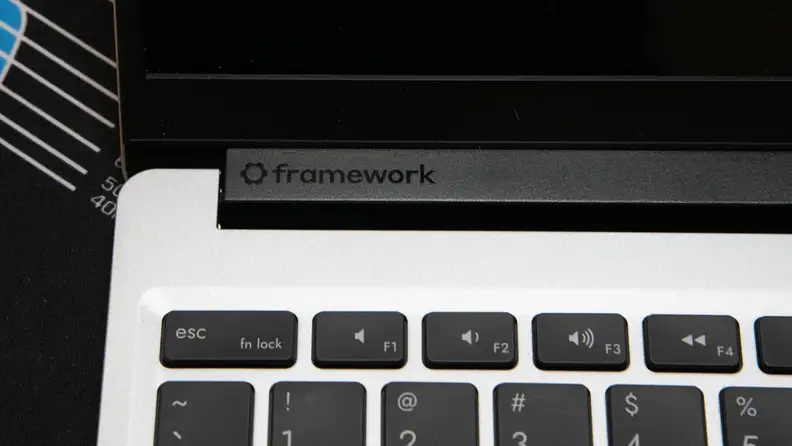 A closeup of the company logo on the hinge.