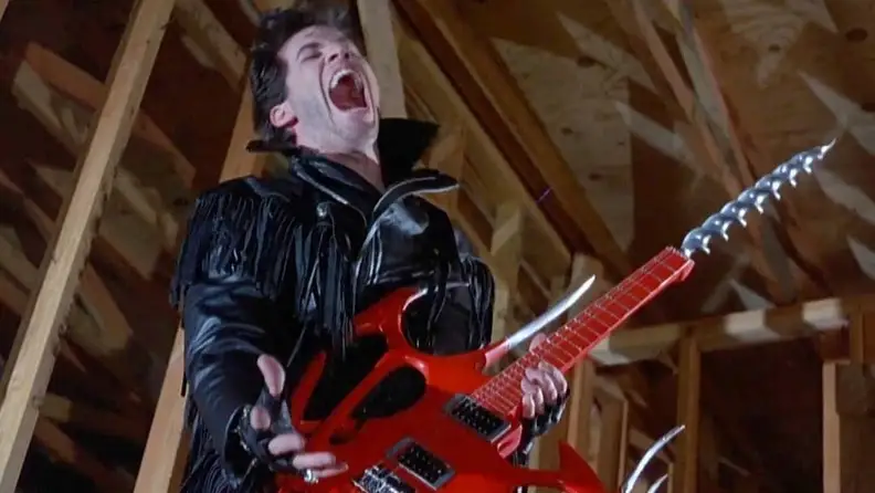 The Driller Killer from "Slumber Party Massacre II" with a power-drill guitar in hand.