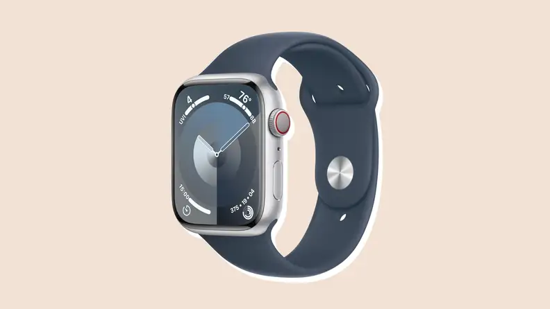 A silver-bezel Apple Watch in blue navy band with the face set to a blue background.