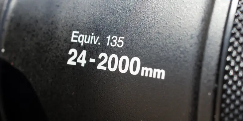 The P900 has a 24-2000mm equivalent zoom.