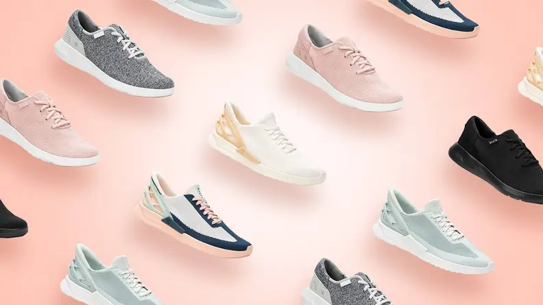 Multiple Kizik shoes all facing right on pink background