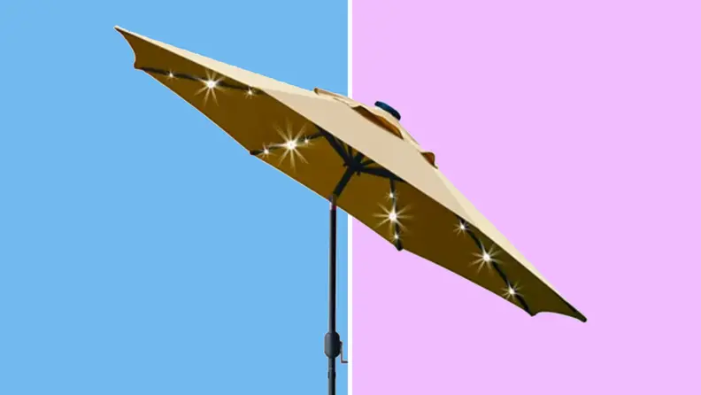 An image of a yellow umbrella with solar-powered LED lights set into the individual ribs.