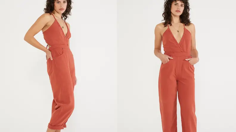 woman wearing copper one piece jumpsuit