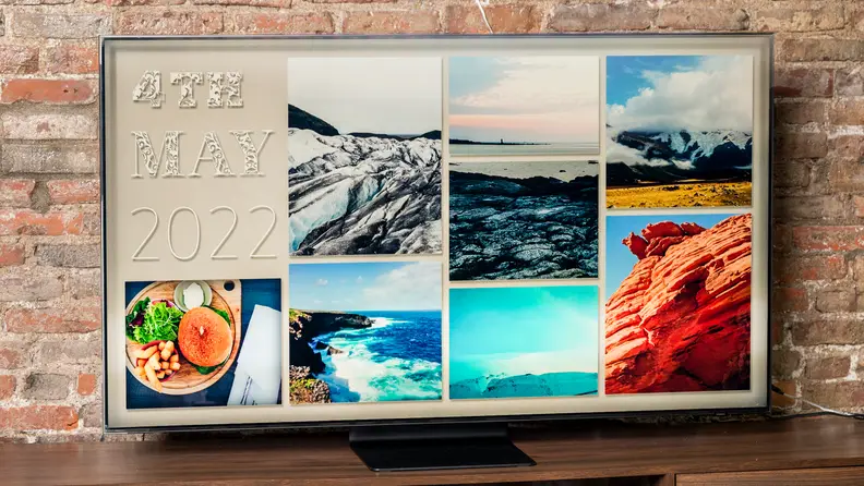 Smart television in front of brick wall.