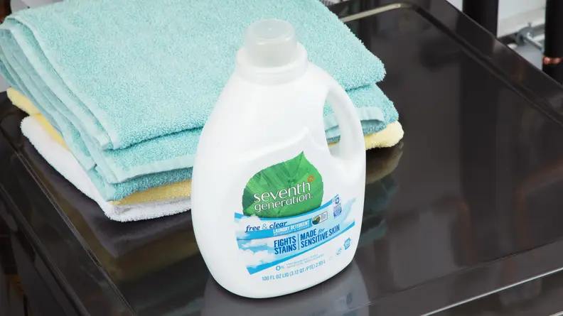 Seventh Generation Free & Clear eco-friendly laundry detergent on top of a washing machine