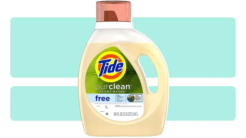 A bottle of Tide Purclean laundry detergent on an orange background.