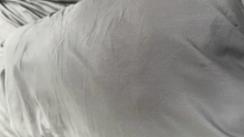 Dark sweat stains on the gray Bedsure Cooling fitted Sheet.
