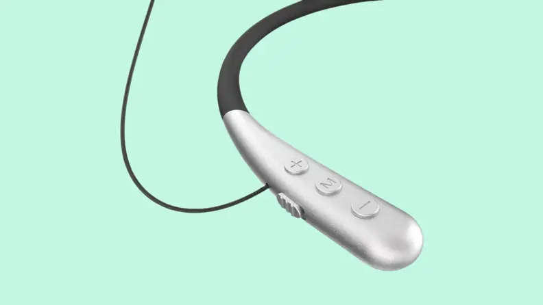 A Clearcast hearing aid on an orange background.