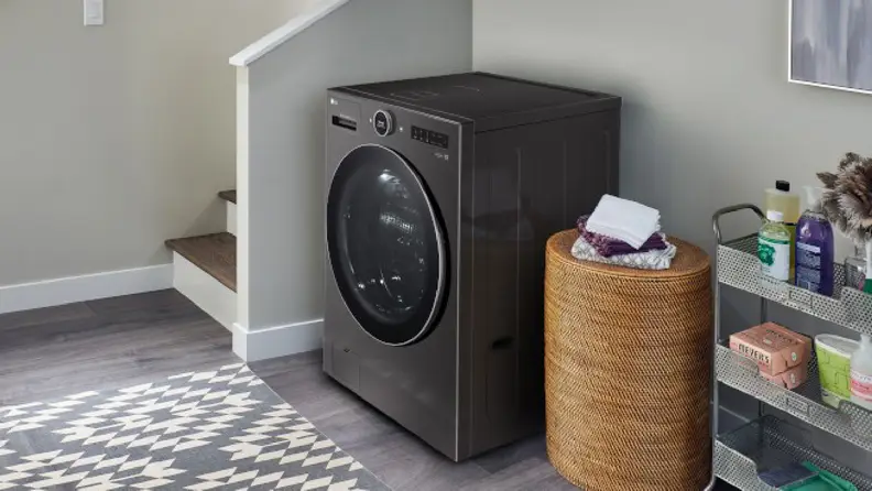 The LG WM6998HBA All-in-One washer-dryer combo set up in a modern home.