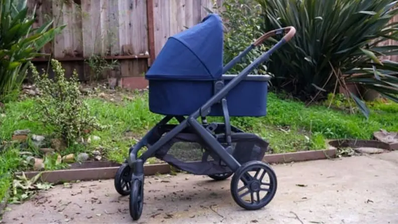 The Uppababy Vista V2 stroller with the canopy open, outside.