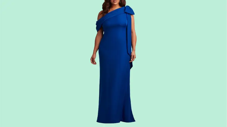 A model wearing a blue one-shoulder gown.