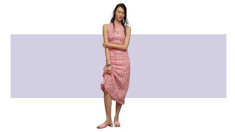 A pink textured midi dress.