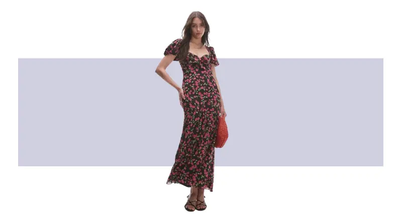 A full-length floral print dress.
