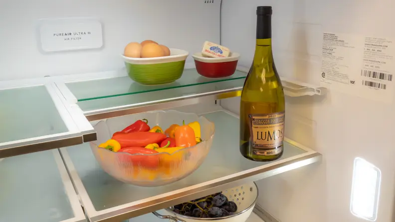 The upper shelves are adjustable to accommodate taller items.
