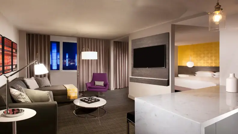 A view of a hotel room showing a relaxing living space