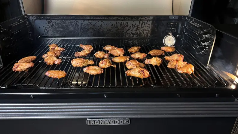 Chicken wings being grilled on the Traeger Ironwood XL Pellet Grill.