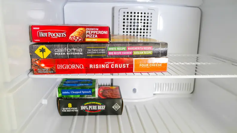The freezer has a single wire shelf with no separate temperature control
